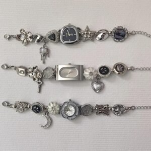 Bold Y2K wristwear bracelet incorporating charm sets and layered button interaction