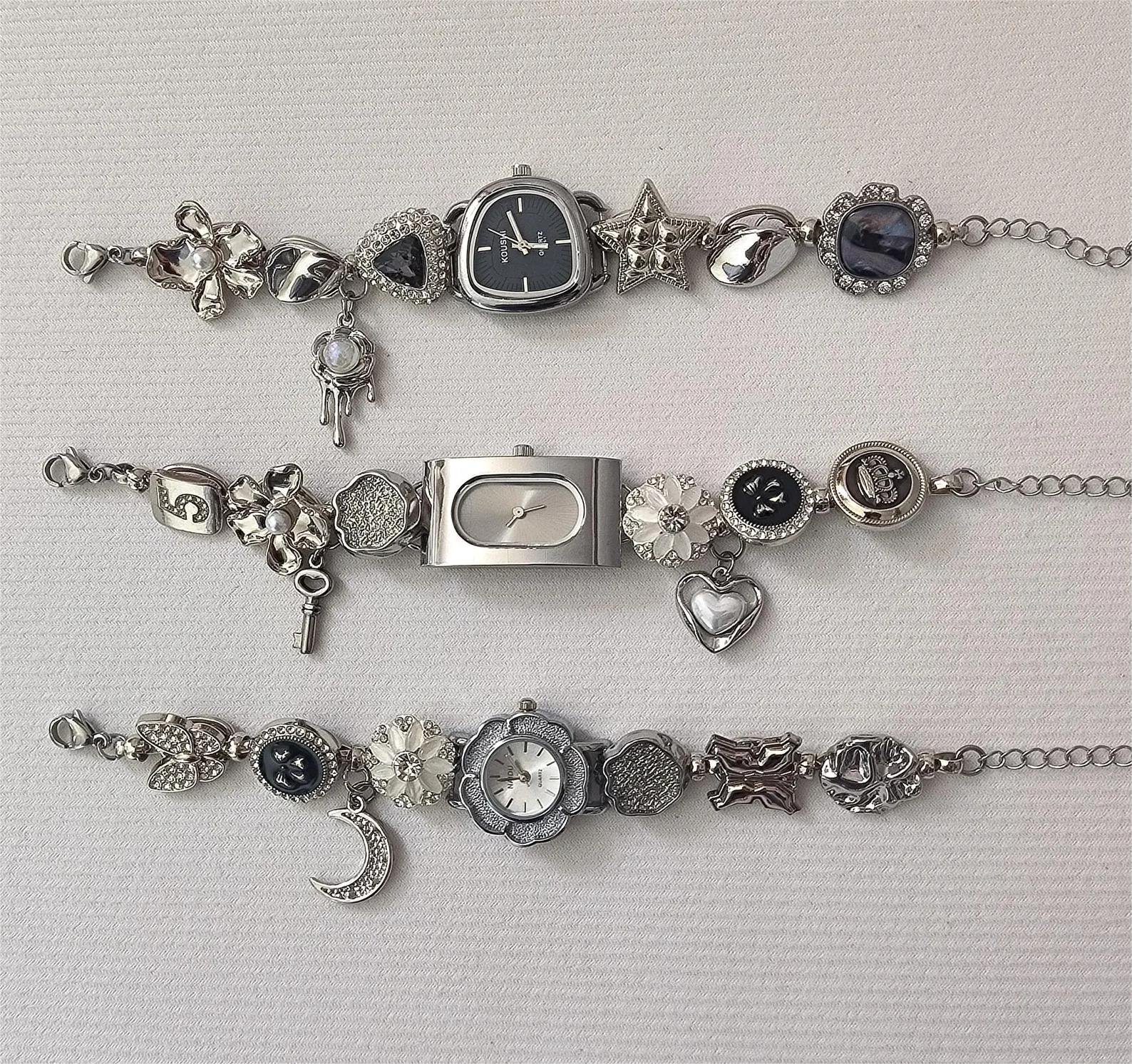 Bold Y2K wristwear bracelet incorporating charm sets and layered button interaction