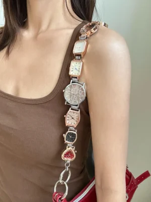 Styled by celebrities: pop culture watch bag charm inspired by Bella Hadid, a unique accessory for any purse.