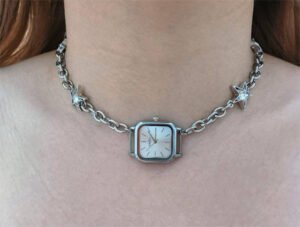 Handmade multi-watch face choker necklace worn by Emma Chamberlain