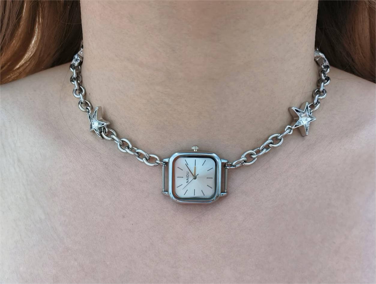 Handmade multi-watch face choker necklace worn by Emma Chamberlain