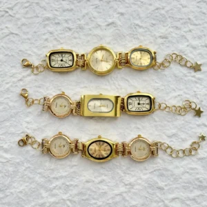 Sleek cyberwear watch bracelet enhanced by titanium charm fixtures and buttoned structure