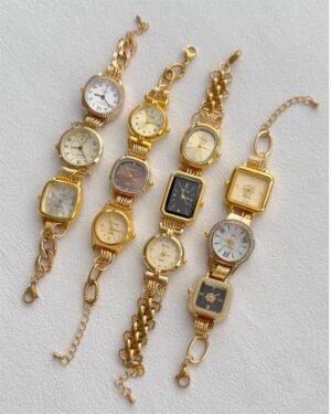 Titanium watch bracelet crafted for Y2K fashion and Taylor Swift energy, layered charms and precision buttons