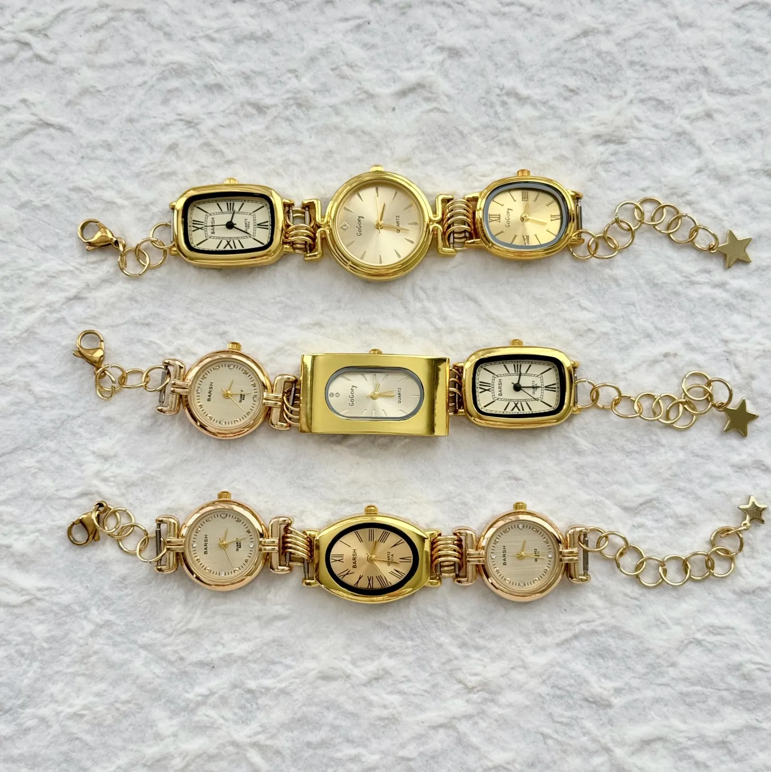 Sleek cyberwear watch bracelet enhanced by titanium charm fixtures and buttoned structure