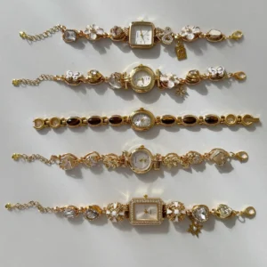 Stainless steel bracelet watch using button-locked charm mechanics