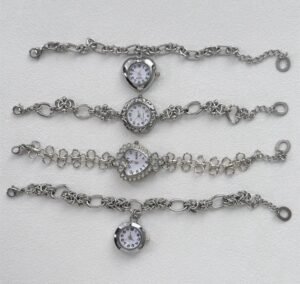 Tailor Swift-inspired titanium fashion bracelet featuring suspended charms and signature buttons