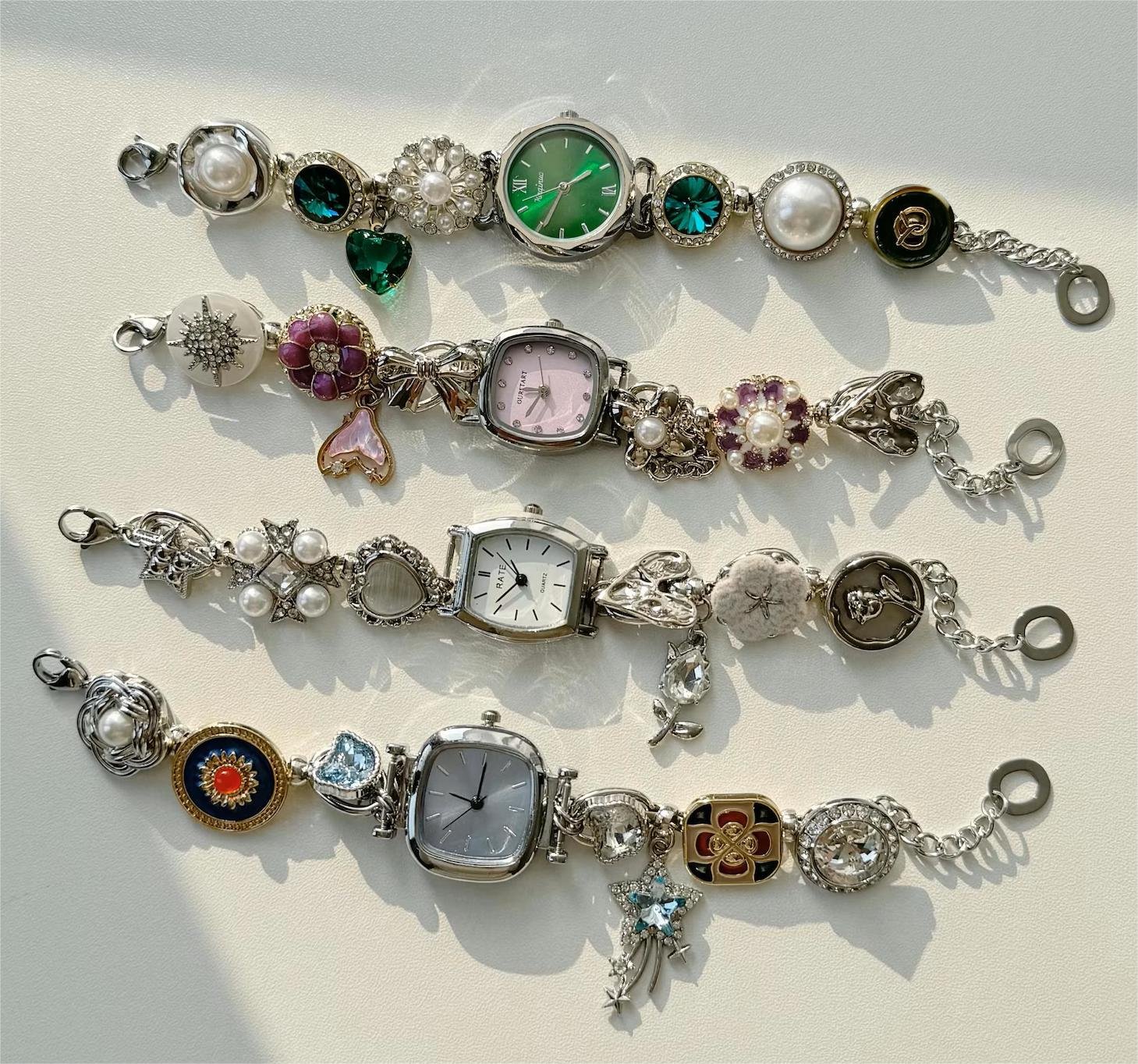Artisan stainless steel fashion watch bracelet using mini charm attachments and button locks