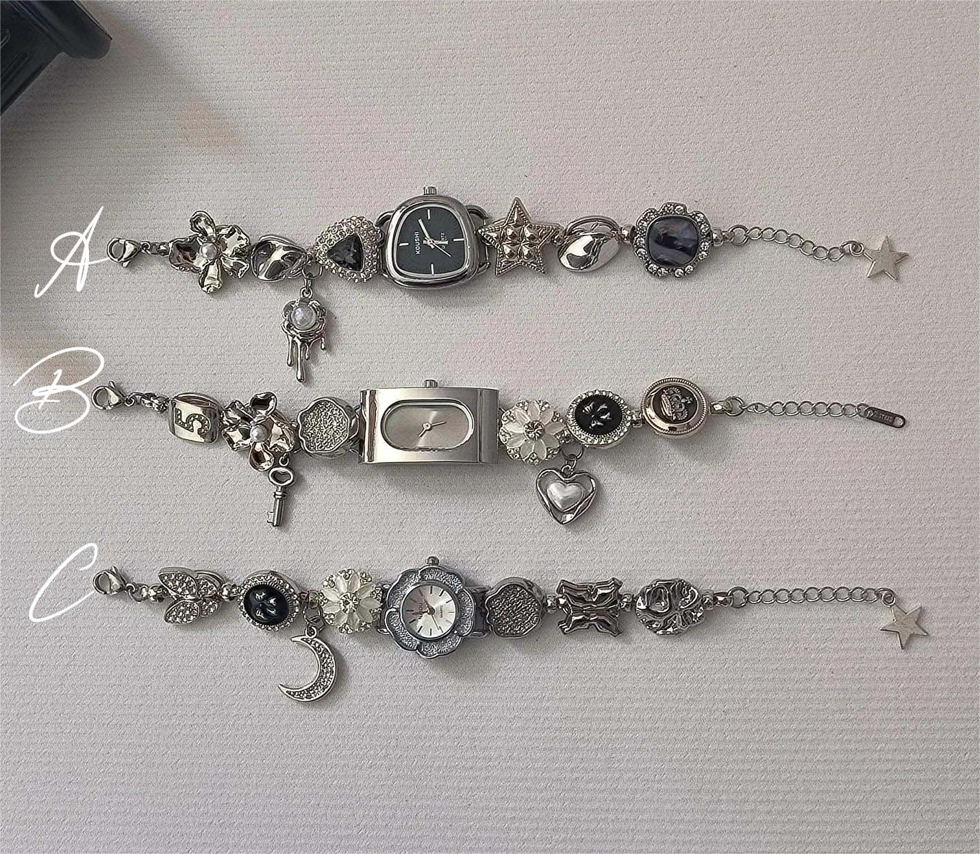 Brushed stainless steel watch bracelet using oversized charm tech and tactile buttons