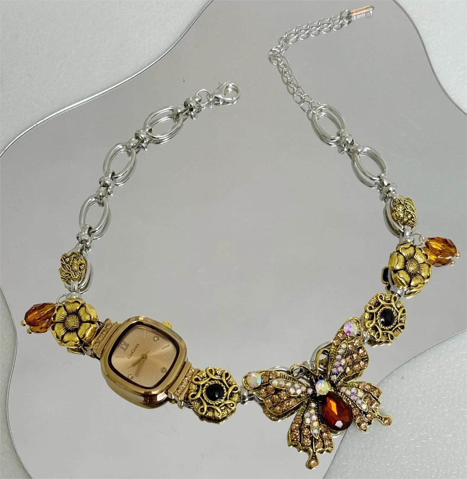 Handmade retro-futuristic watch choker necklace popular with celebrities like Hailey Bieber