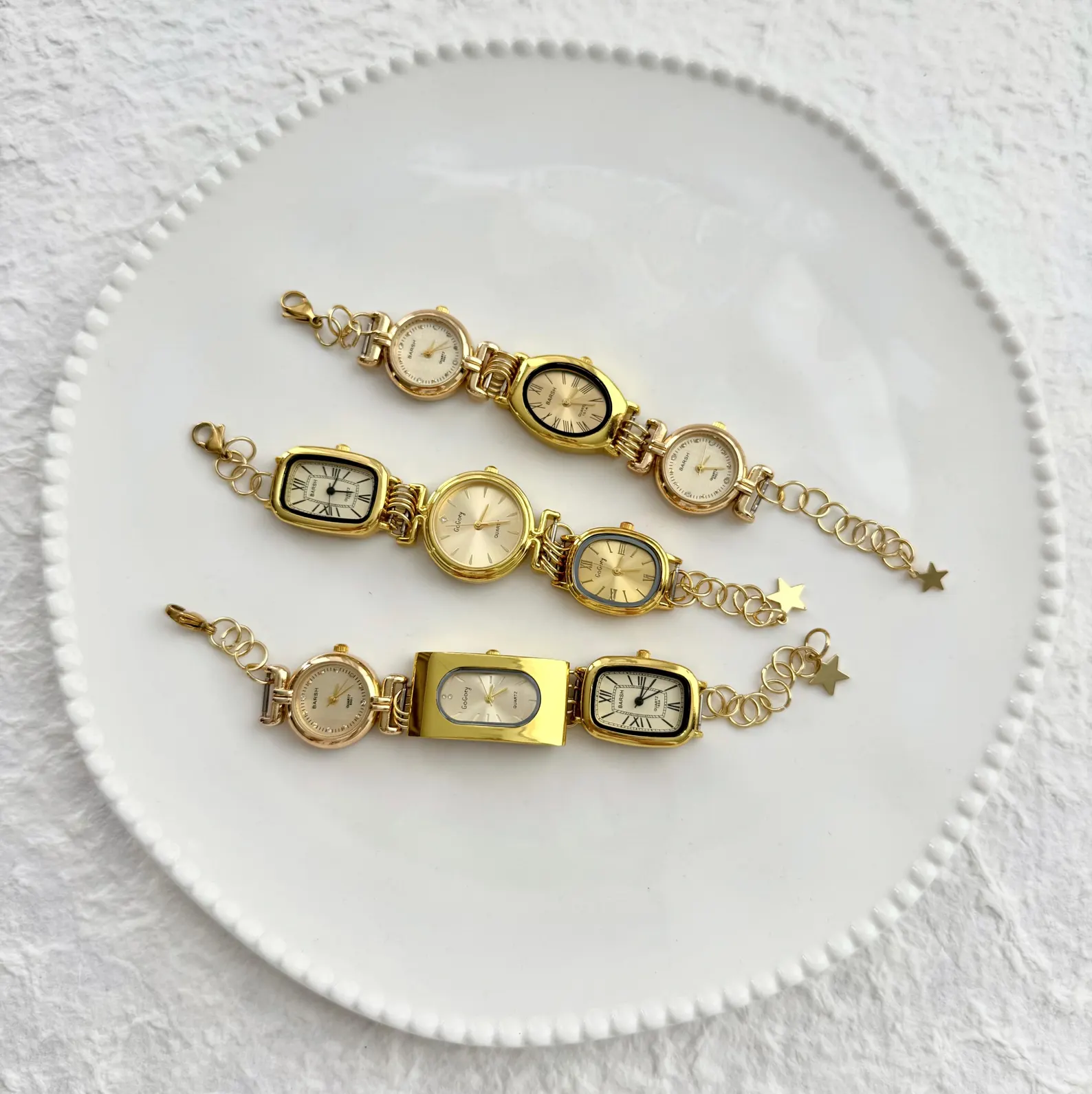 Y2K charm bracelet watch engineered from titanium, designed for button transitions