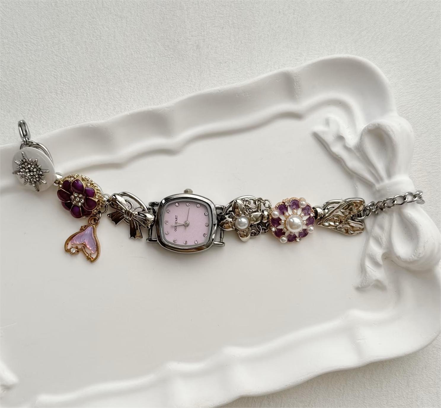 Fashion accessory watch bracelet handmade from titanium using industrial buttons and drop charms