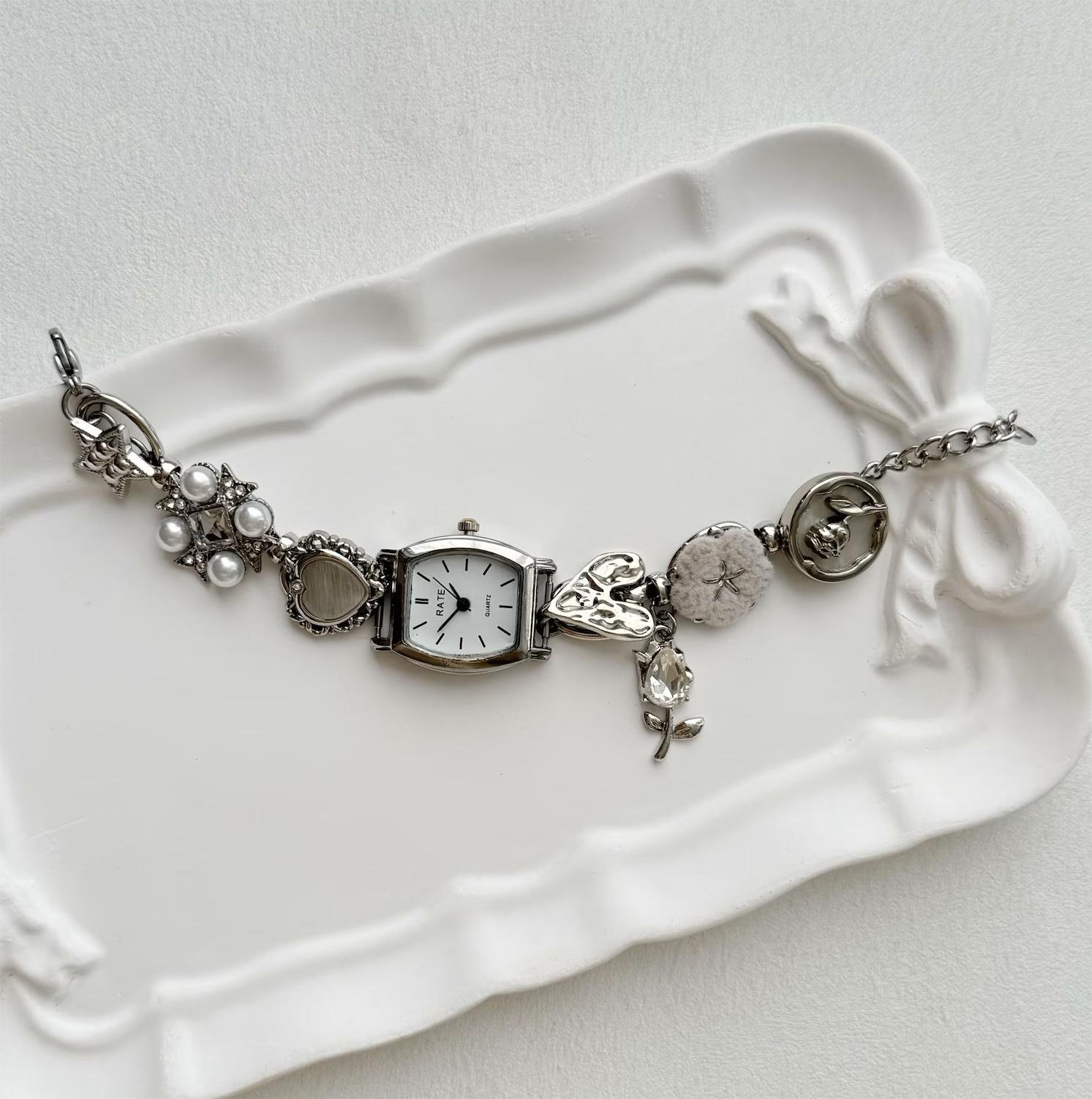 Core fashion titanium bracelet watch built for charm rotation and button input features