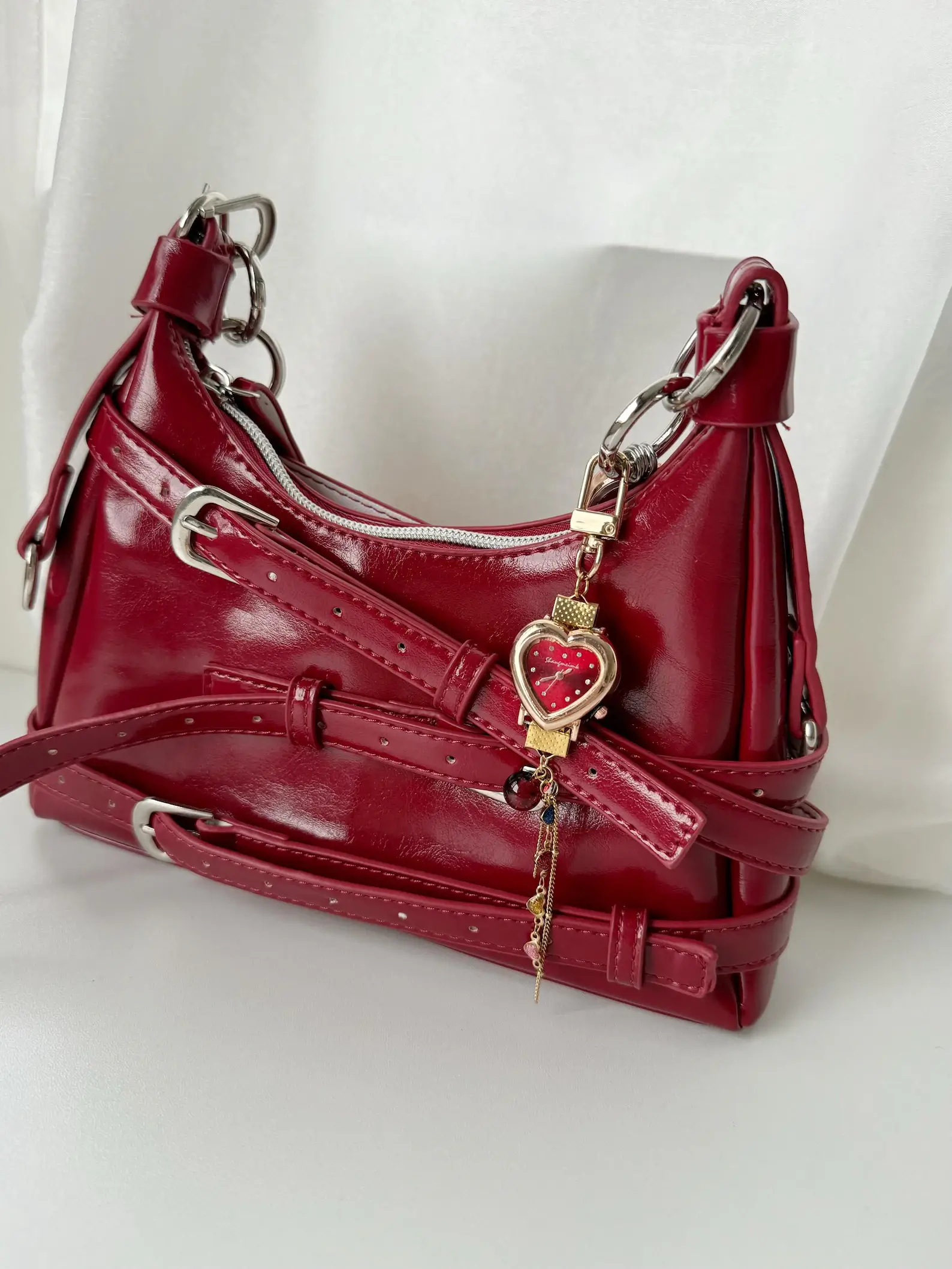 A fashion-forward choice: glam watch bag charm inspired by Ariana Grande, perfect for totes, handbags, or backpacks.