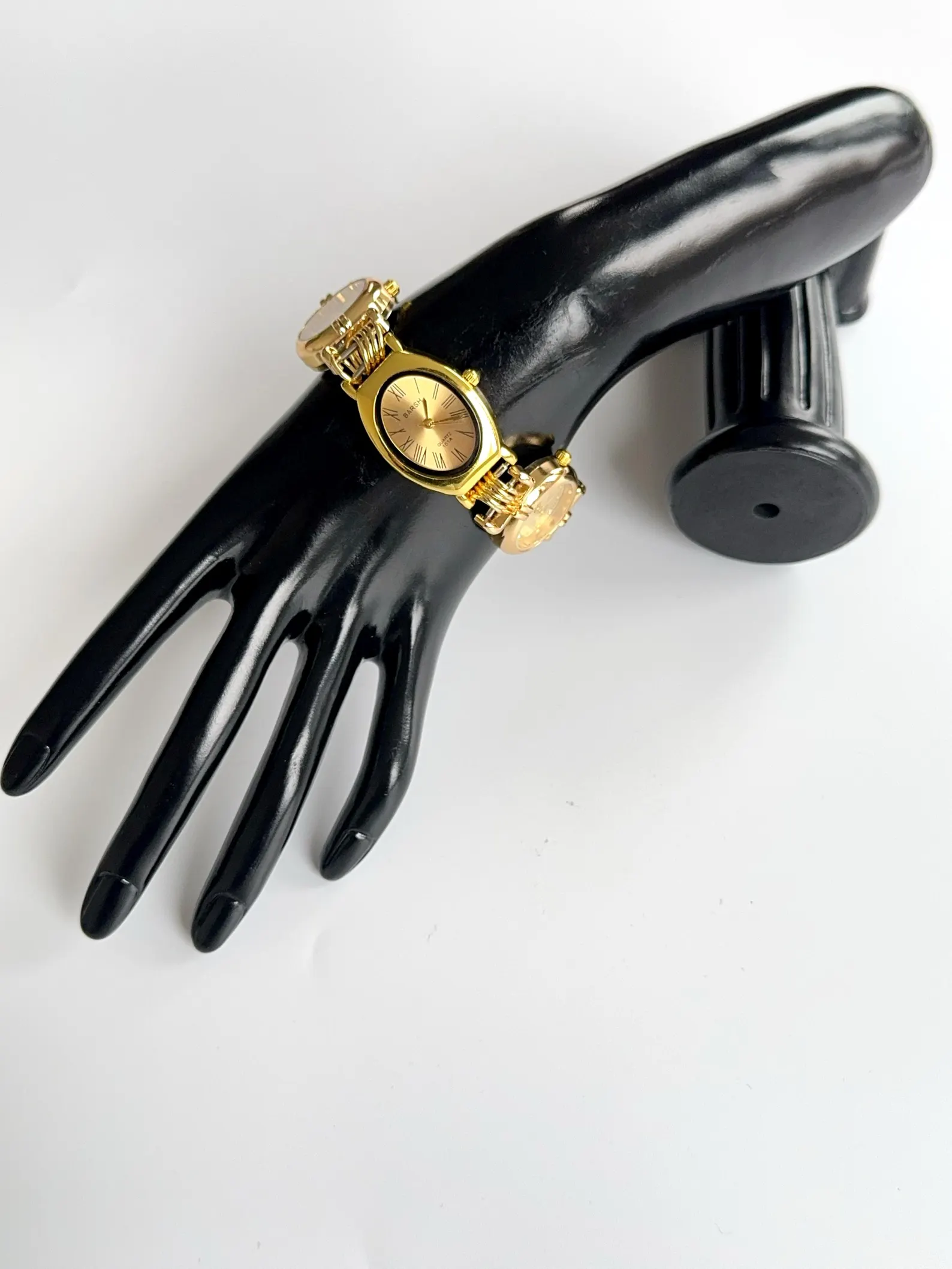 Y2K-ready titanium watch bracelet optimized for sleek charm display and button sequencing Gold