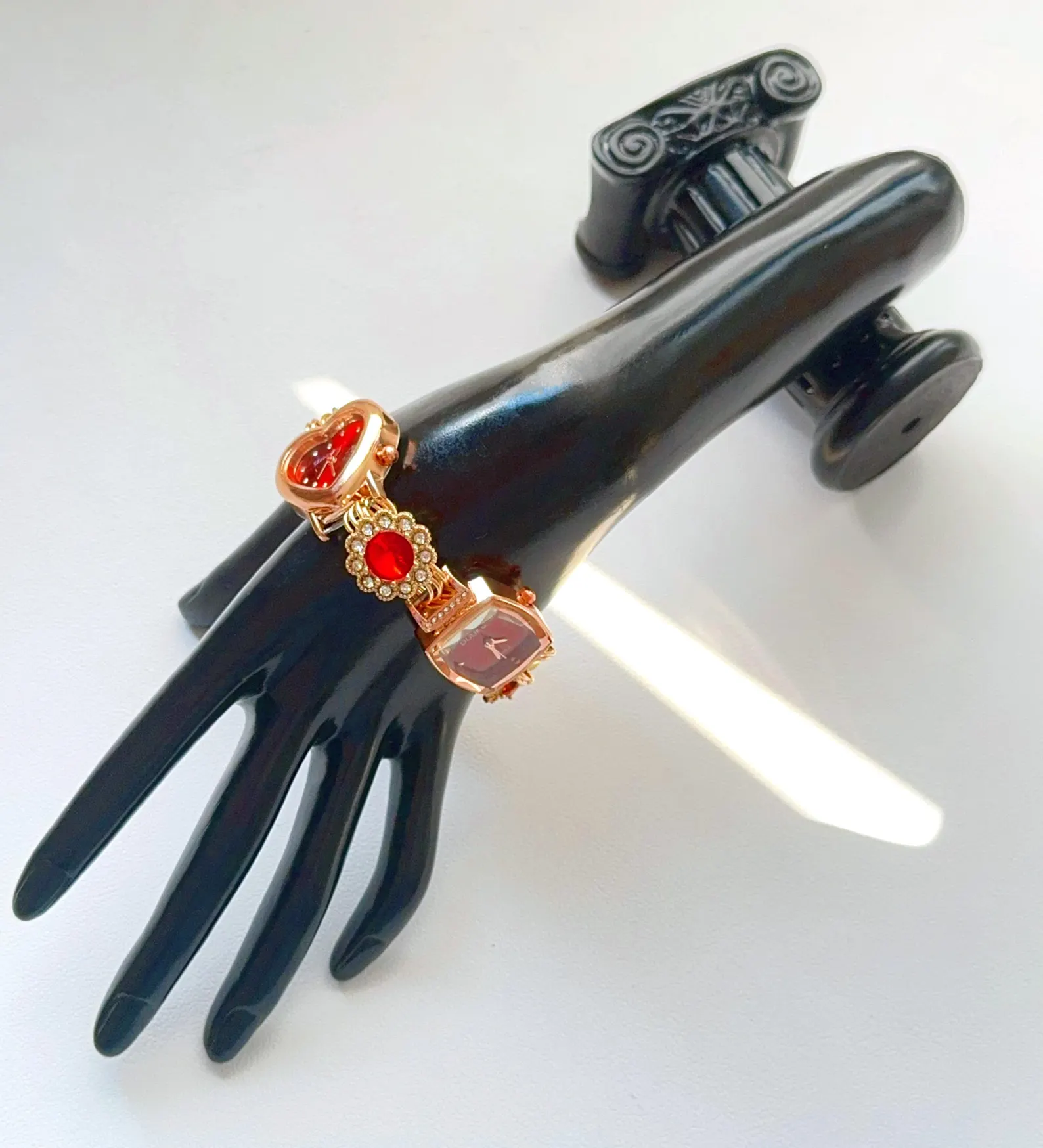 Cyberpunk watch bracelet designed for motion charm integration and streamlined button features