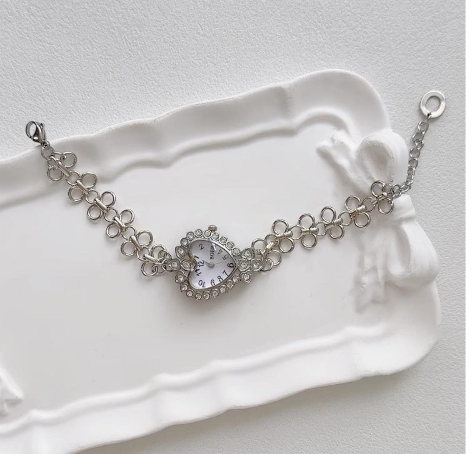 Titanium fashion bracelet tailored as a nod to Taylor Swift style using elegant charms and lock buttons