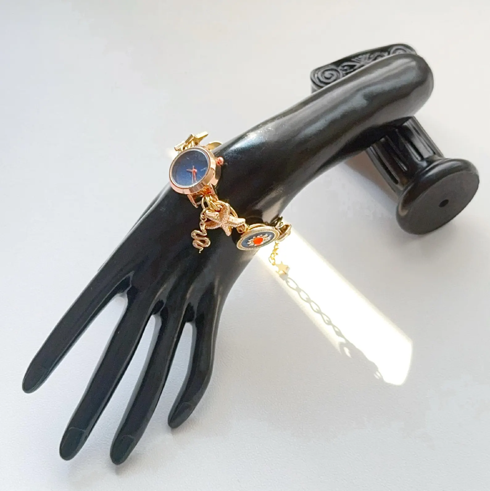 Y2K blue bracelet watch with charm buttons and textured stainless steel links