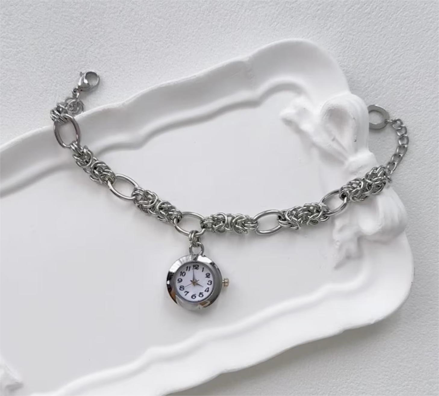 Fashion statement watch bracelet in stainless steel, crafted for Swifties using charm drops and press buttons