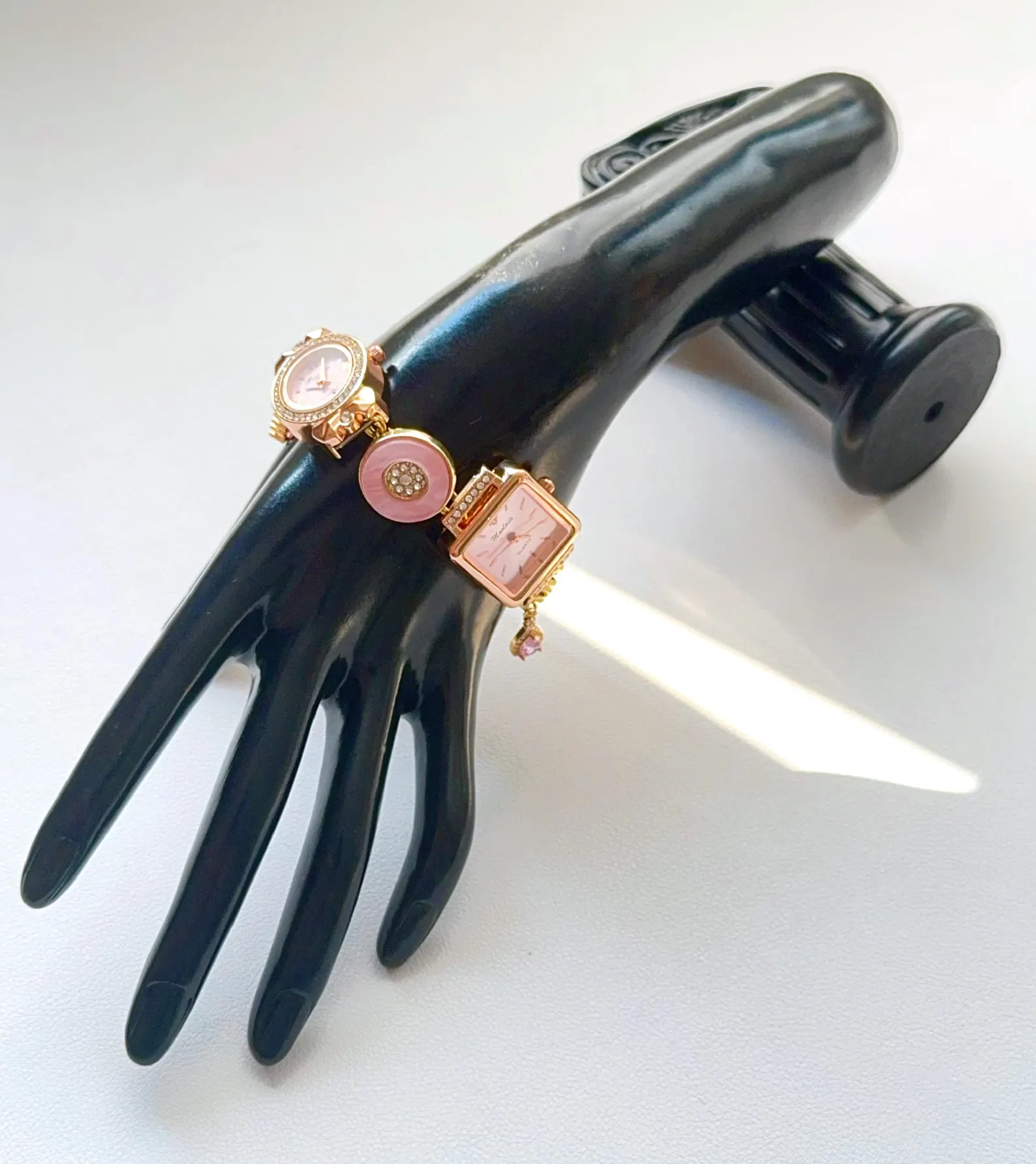 Bold techwear bracelet watch sculpted for charm activation and touch-based buttons