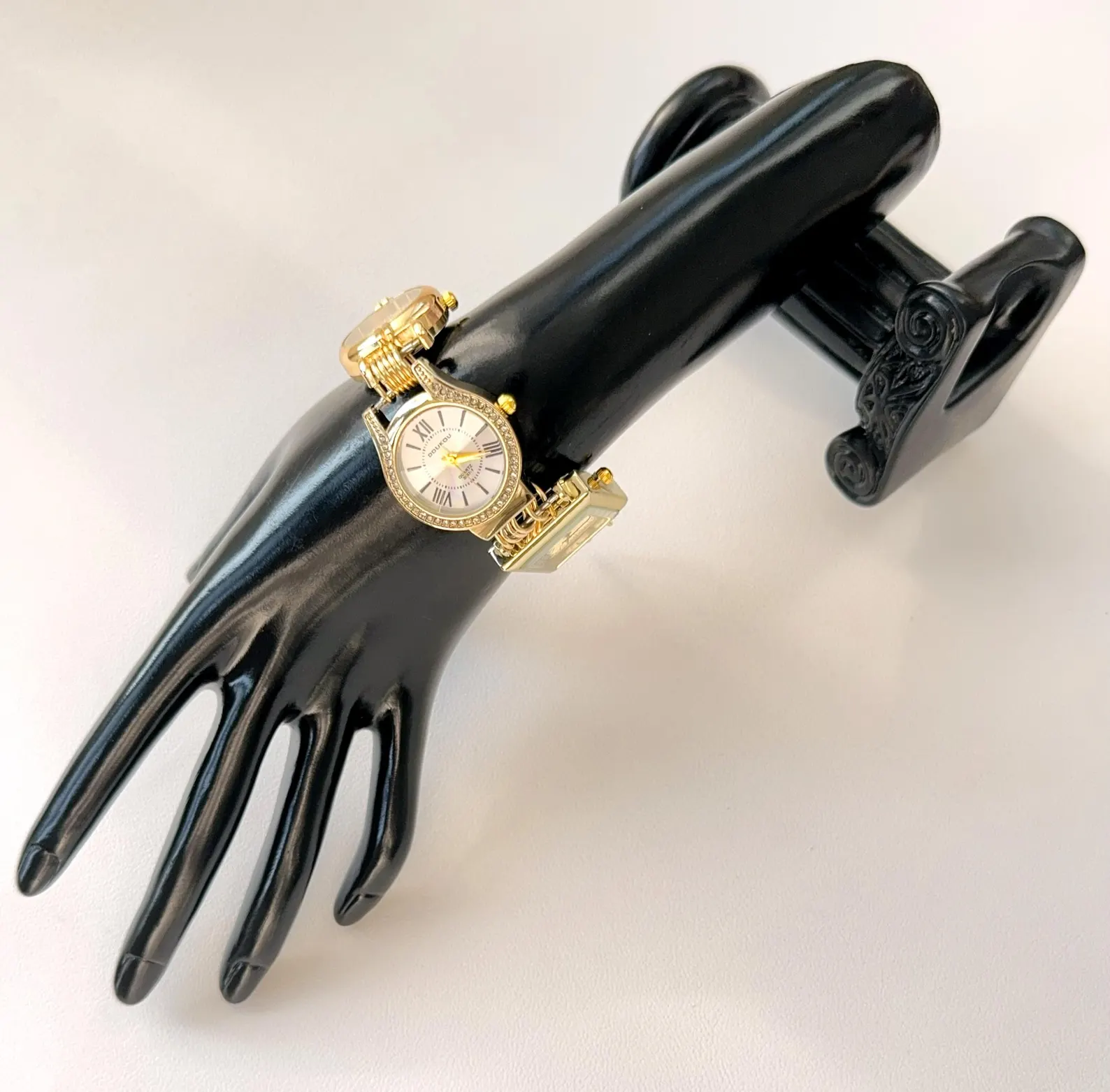 Layered gold bracelet watch for fashion-forward women