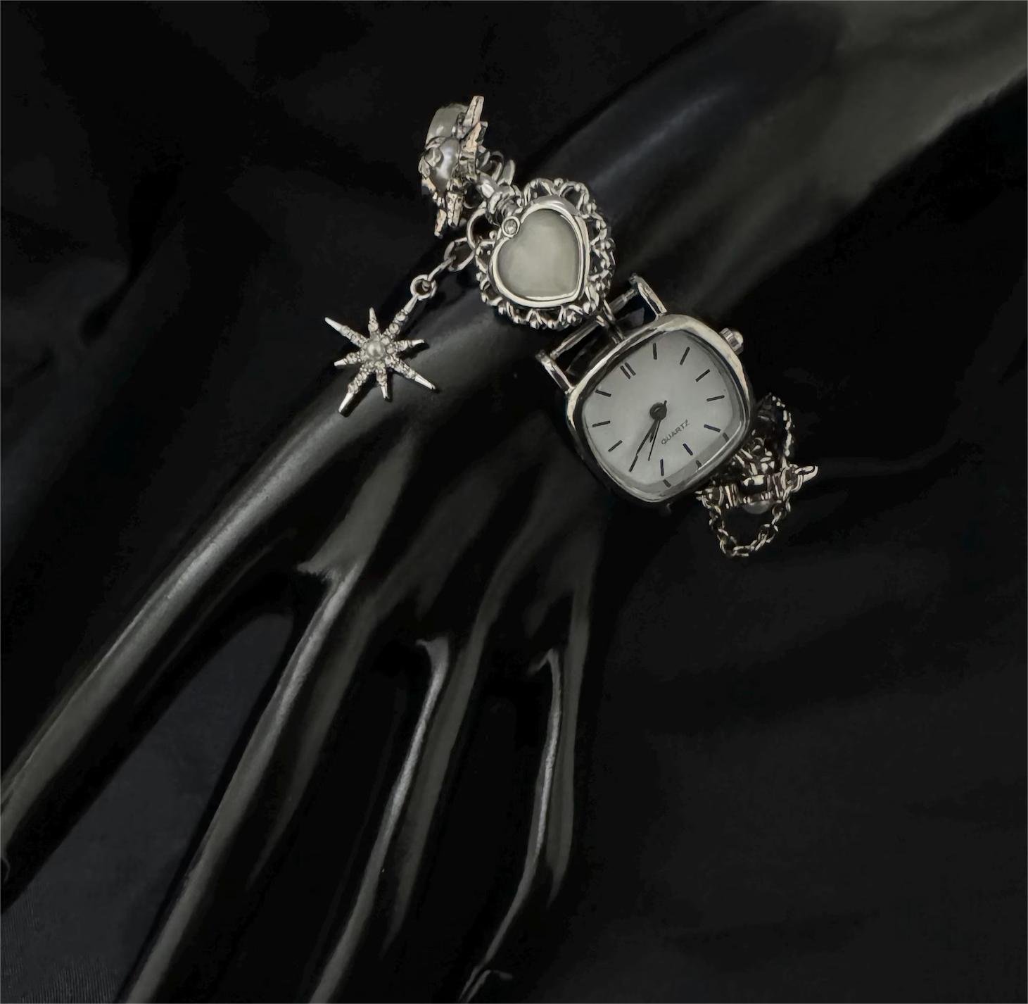 Titanium fashion bracelet handmade for Taylor Swift lovers featuring sculpted buttons and layered charms