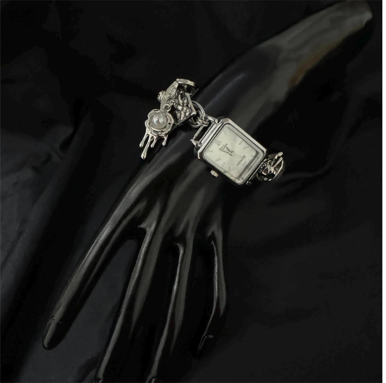 Titanium bracelet handmade for Y2K fashion featuring charms and button clasp for Taylor Swift fans