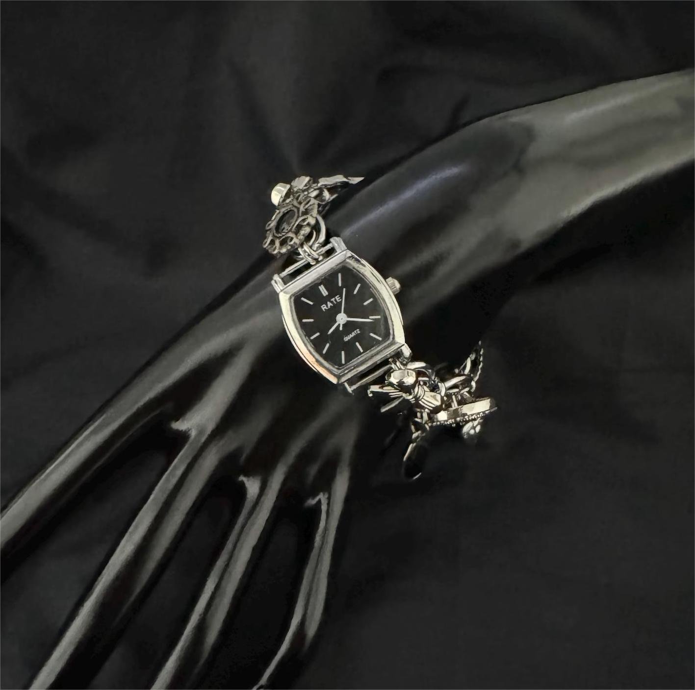 Handmade stainless steel bracelet made as a Taylor Swift signature fashion statement, button pattern and charm flow