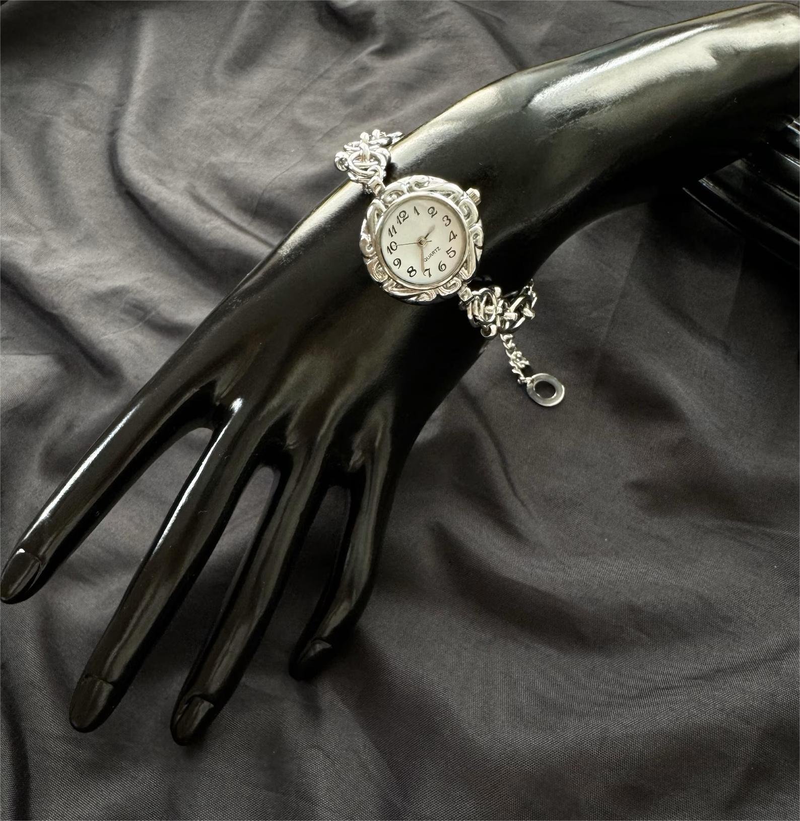 Tailor-designed titanium bracelet celebrating Taylor Swift looks, built with charm accents and metal buttons