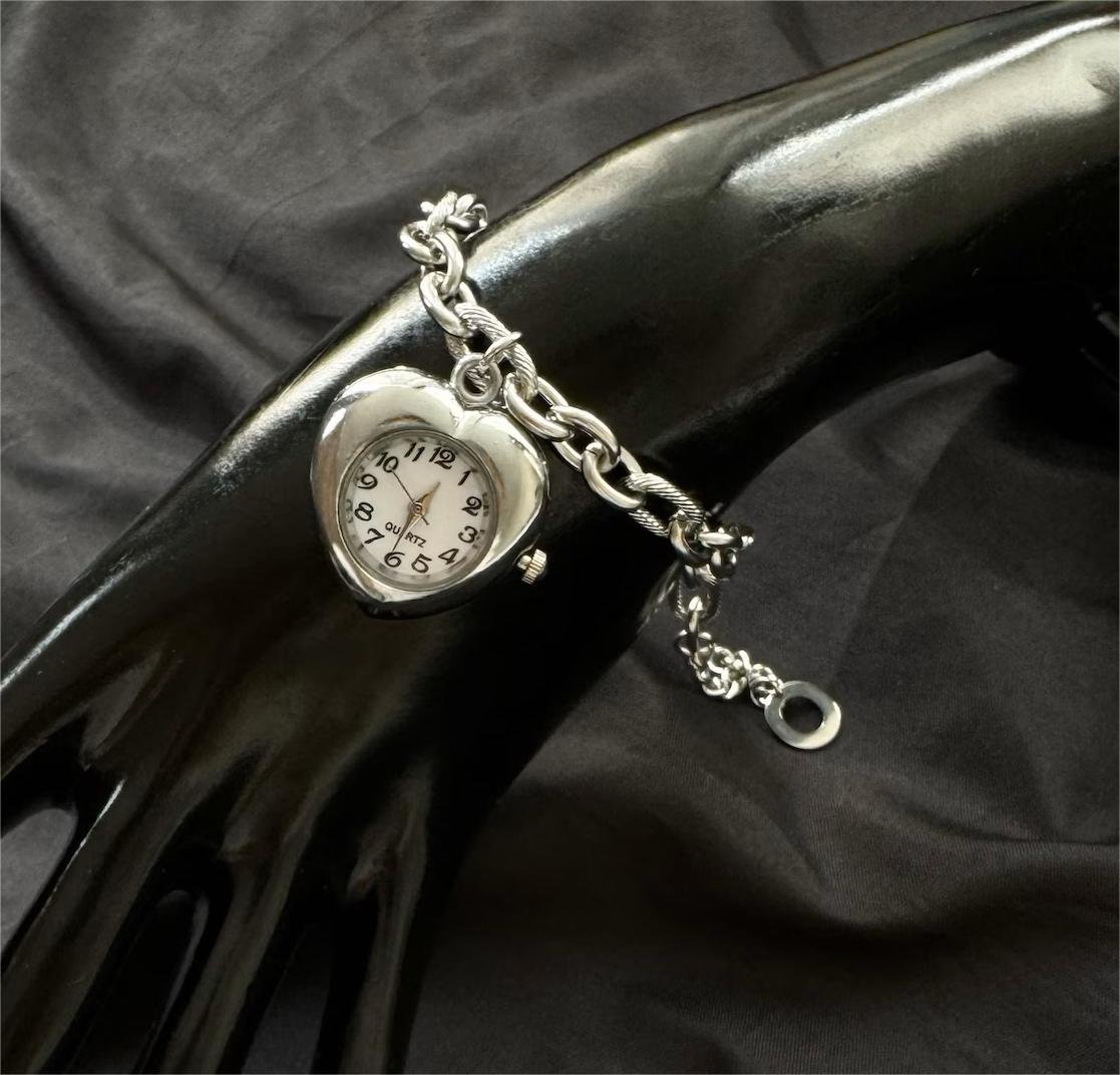 Handmade titanium watch bracelet inspired by Taylor Swift featuring charms and tactile buttons