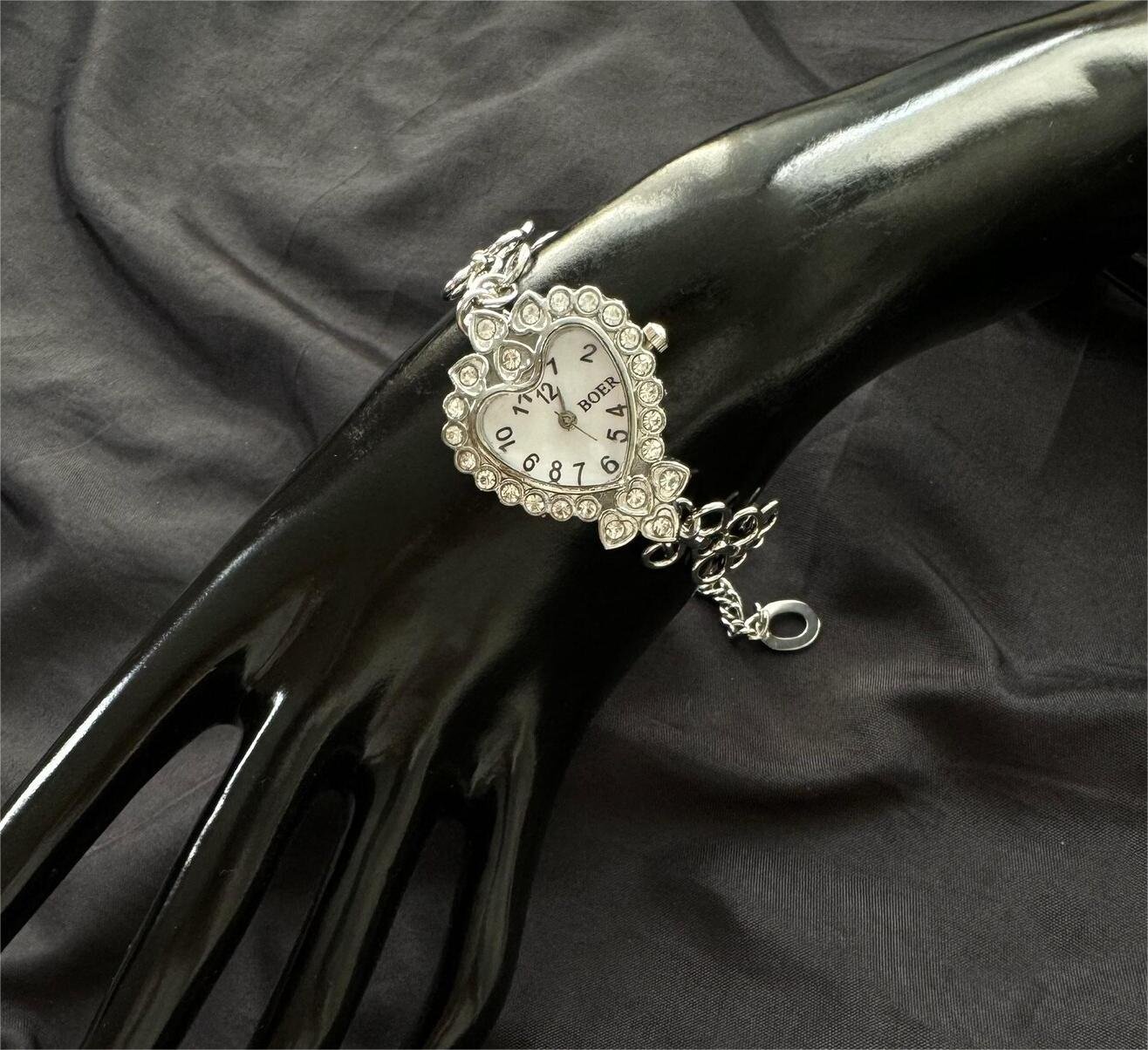 Fashion Heart watch bracelet handmade in stainless steel, incorporating buttons and decorative charms