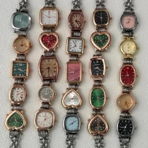✔ Fully Functional Timepieces – Not just for style, every watch works! ✔ Premium Materials – Titanium and metal alloy with a rust-resistant coating, adorned with pearl, jade, crystal, buttons, and more. ✔ Default Length - 14" ( +- ) 2" extender chain ✔ Custom Length Available – Leave a note at checkout, and we’ll craft your perfect fit. ✔Carefully Handmade – Every watch bracelet is individually crafted by hand, with special attention to quality and detail. ♡ Processing time: 1–3 business days ♡ Estimated delivery: 5–12 business days (depending on location)