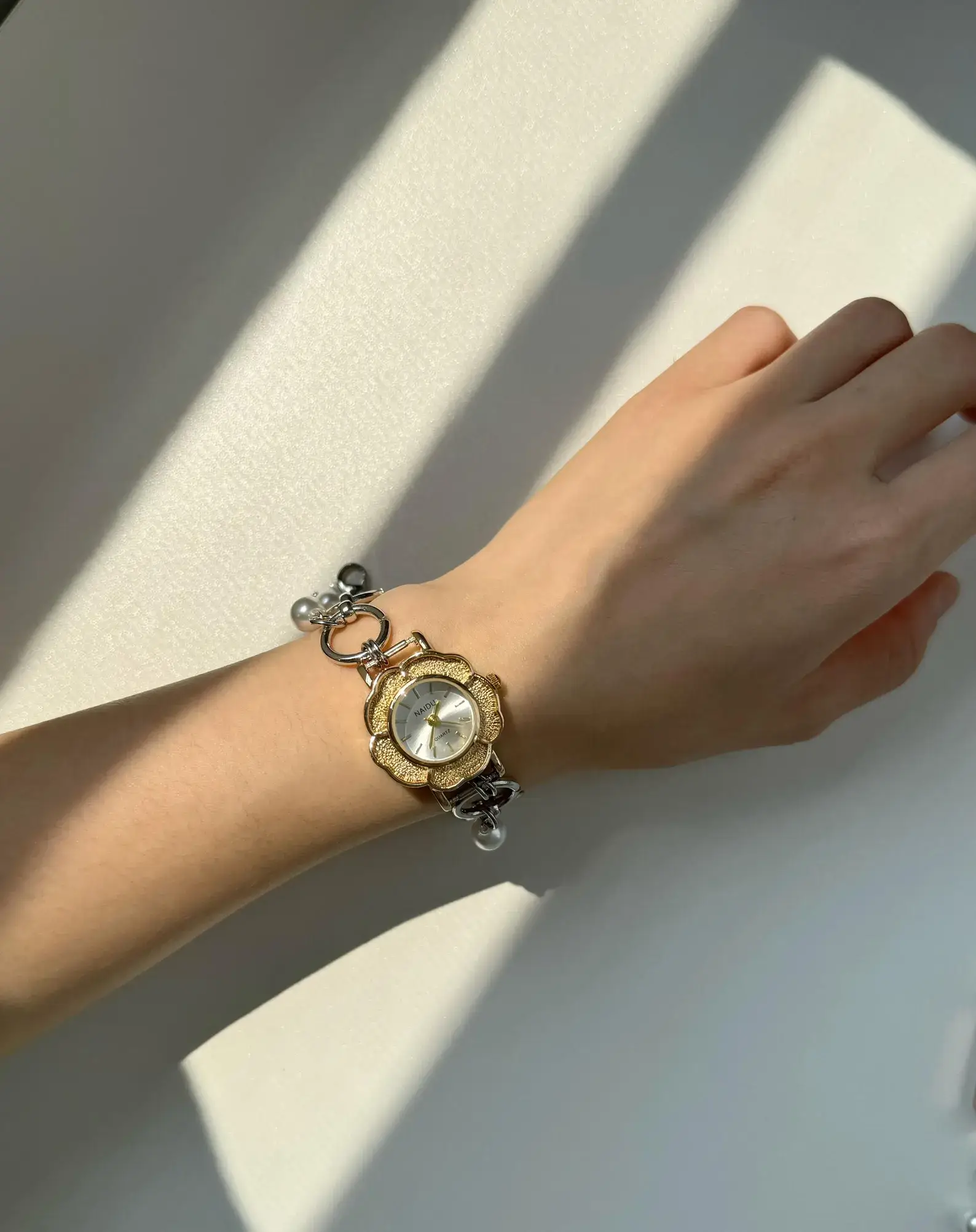 Watch belly chain for women: A delicate adjustable waist jewelry set featuring a functional miniature watch on a dainty silver chain, worn as a belly chain or waist chain around the hips, showcasing a boho-chic, festival-ready look with romantic elegance.