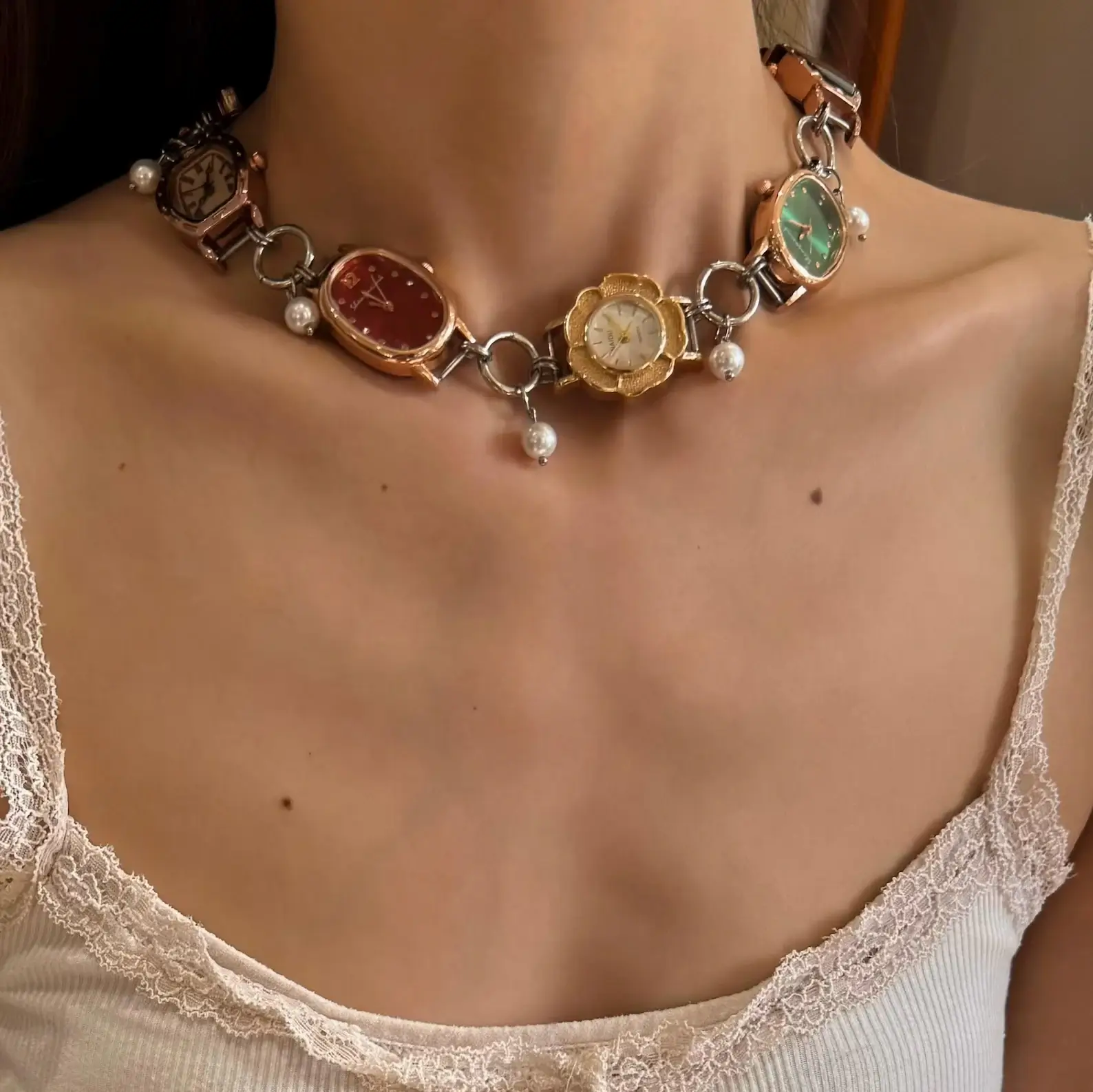 Watch belly chain for women: A delicate adjustable waist jewelry set featuring a functional miniature watch on a dainty silver chain, worn as a belly chain or waist chain around the hips, showcasing a boho-chic, festival-ready look with romantic elegance.