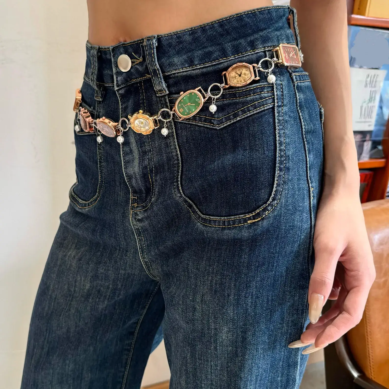 Watch belly chain for women: A delicate adjustable waist jewelry set featuring a functional miniature watch on a dainty silver chain, worn as a belly chain or waist chain around the hips, showcasing a boho-chic, festival-ready look with romantic elegance.