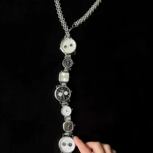 Futuristic unisex watch neckwear tie: A sleek, modern accessory featuring a functional mini watch on a stylish metallic chain, designed to be worn around the neck for a bold, tech-forward look.