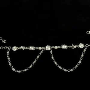 Festival retro-futuristic watch pants chain styled by Travis Scott