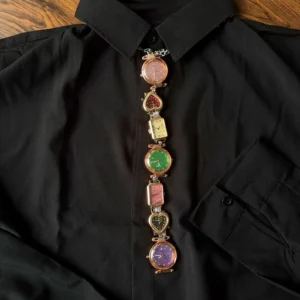 Y2K handmade celebrity watch necktie: A retro-inspired accessory featuring a functional mini watch on a stylish chain, designed to be worn around the neck, capturing the essence of early 2000s fashion with a celebrity touch.