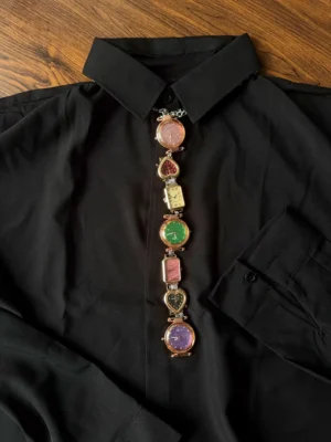 Y2K handmade celebrity watch necktie: A retro-inspired accessory featuring a functional mini watch on a stylish chain, designed to be worn around the neck, capturing the essence of early 2000s fashion with a celebrity touch.
