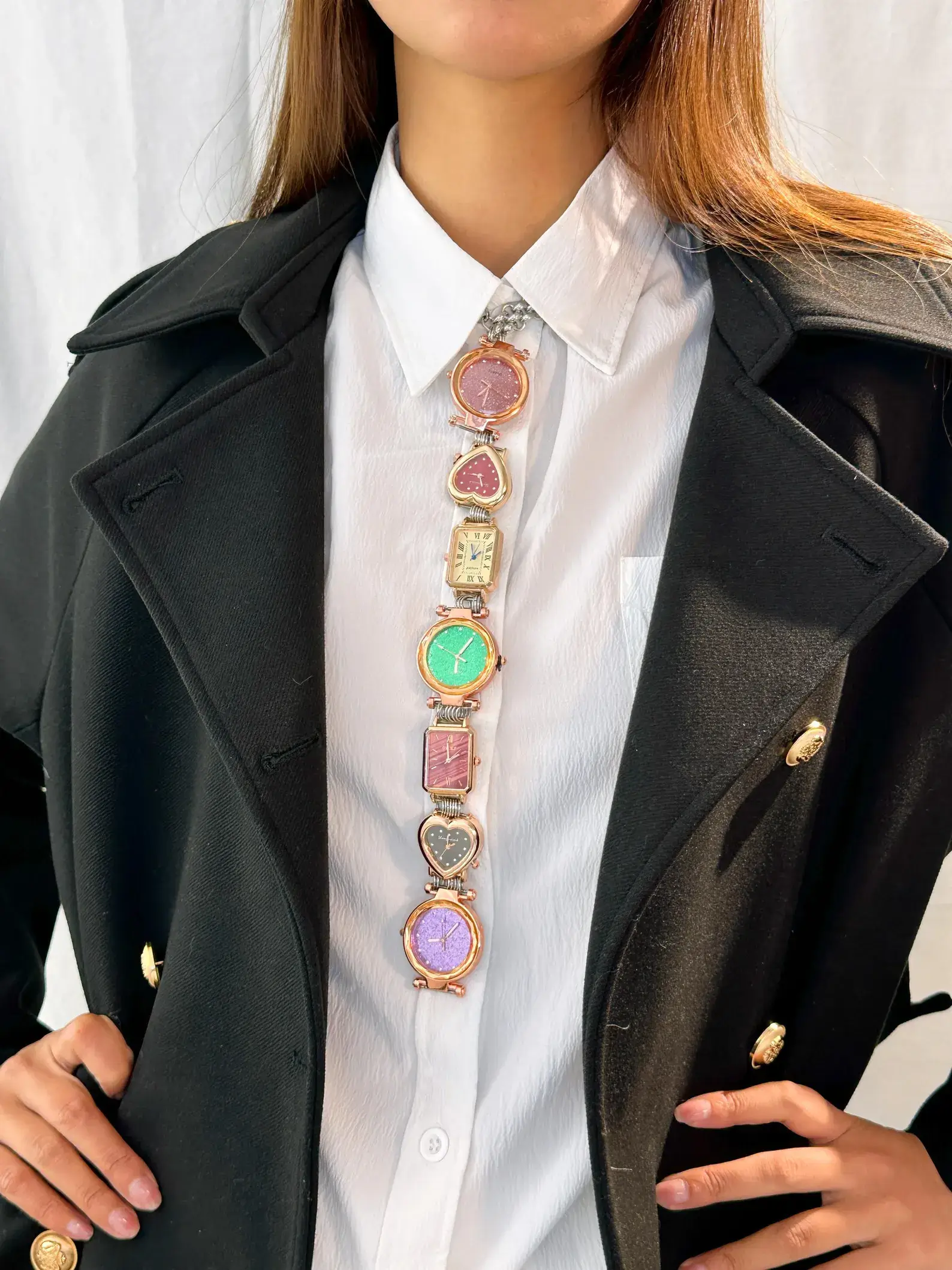Y2K handmade celebrity watch necktie: A retro-inspired accessory featuring a functional mini watch on a stylish chain, designed to be worn around the neck, capturing the essence of early 2000s fashion with a celebrity touch.