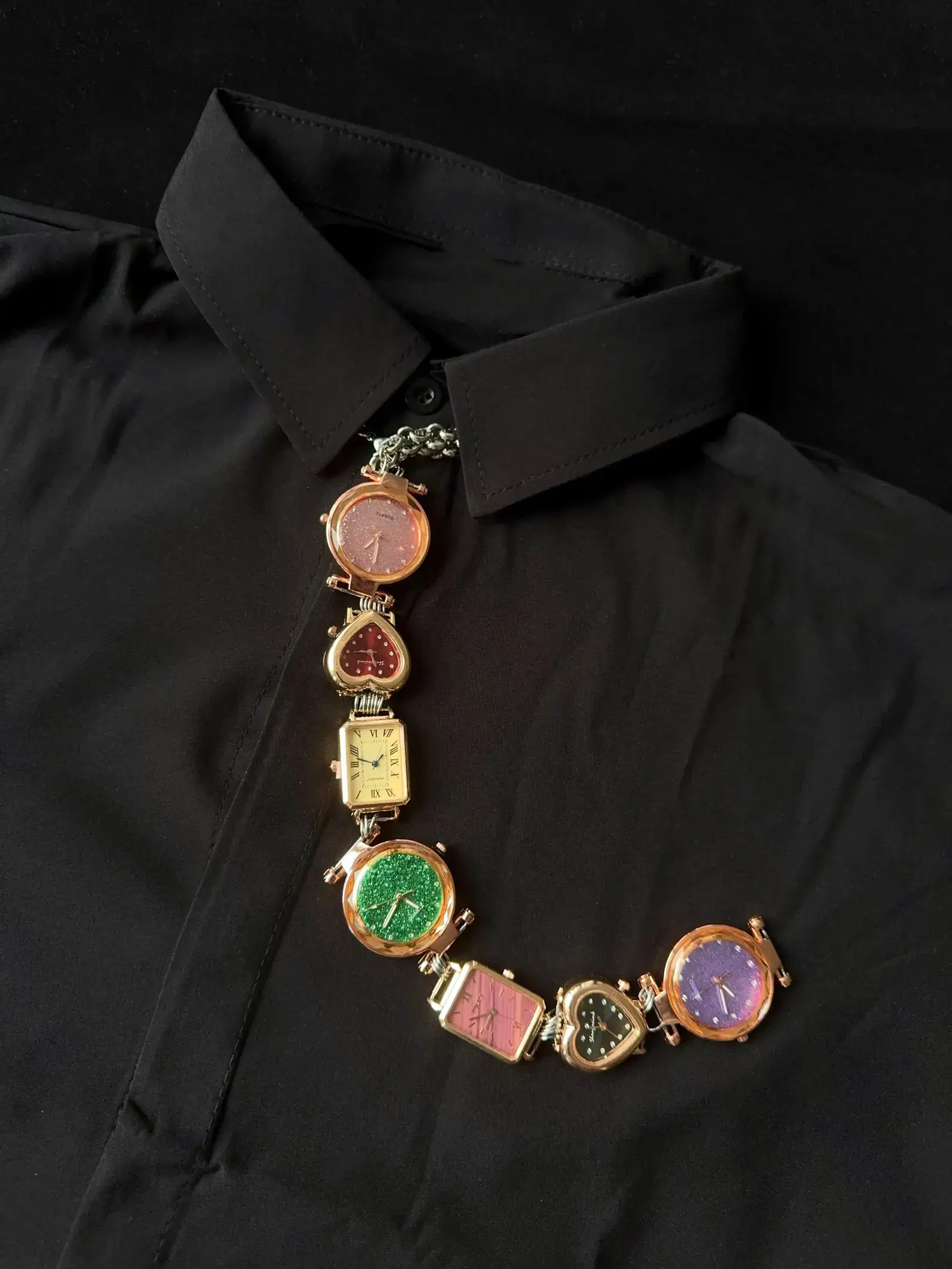 Y2K handmade celebrity watch necktie: A retro-inspired accessory featuring a functional mini watch on a stylish chain, designed to be worn around the neck, capturing the essence of early 2000s fashion with a celebrity touch.