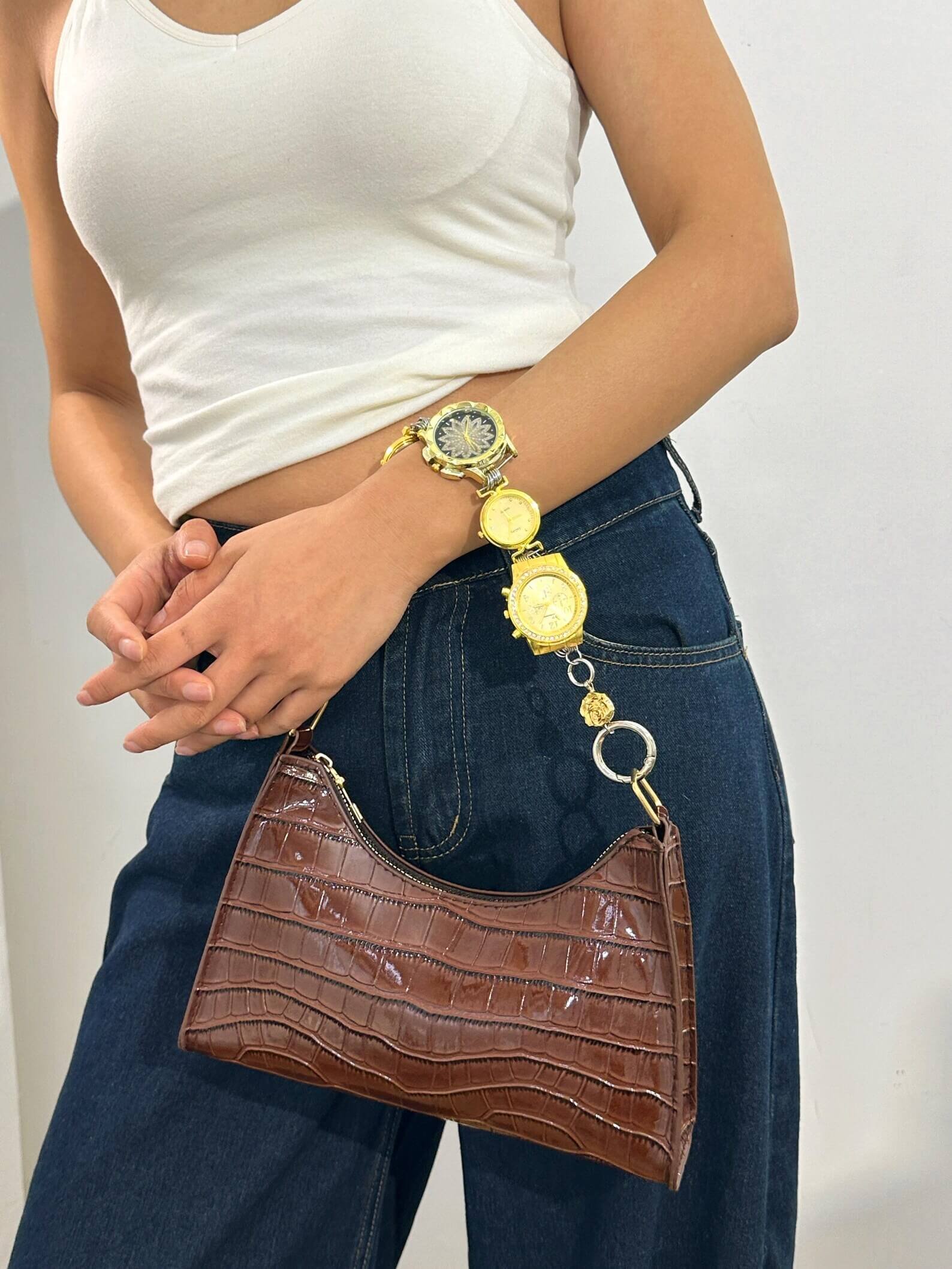 Chrome cyberpunk watch bag chain styled by Billie Eilish
