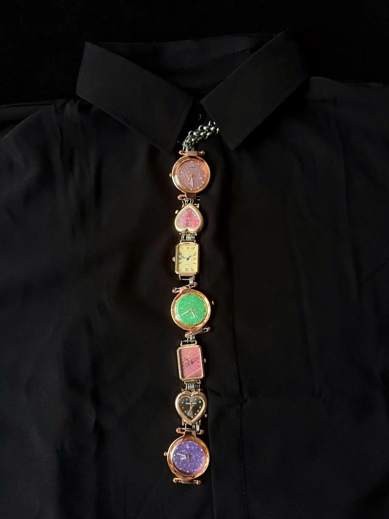 Y2K handmade celebrity watch necktie: A retro-inspired accessory featuring a functional mini watch on a stylish chain, designed to be worn around the neck, capturing the essence of early 2000s fashion with a celebrity touch.