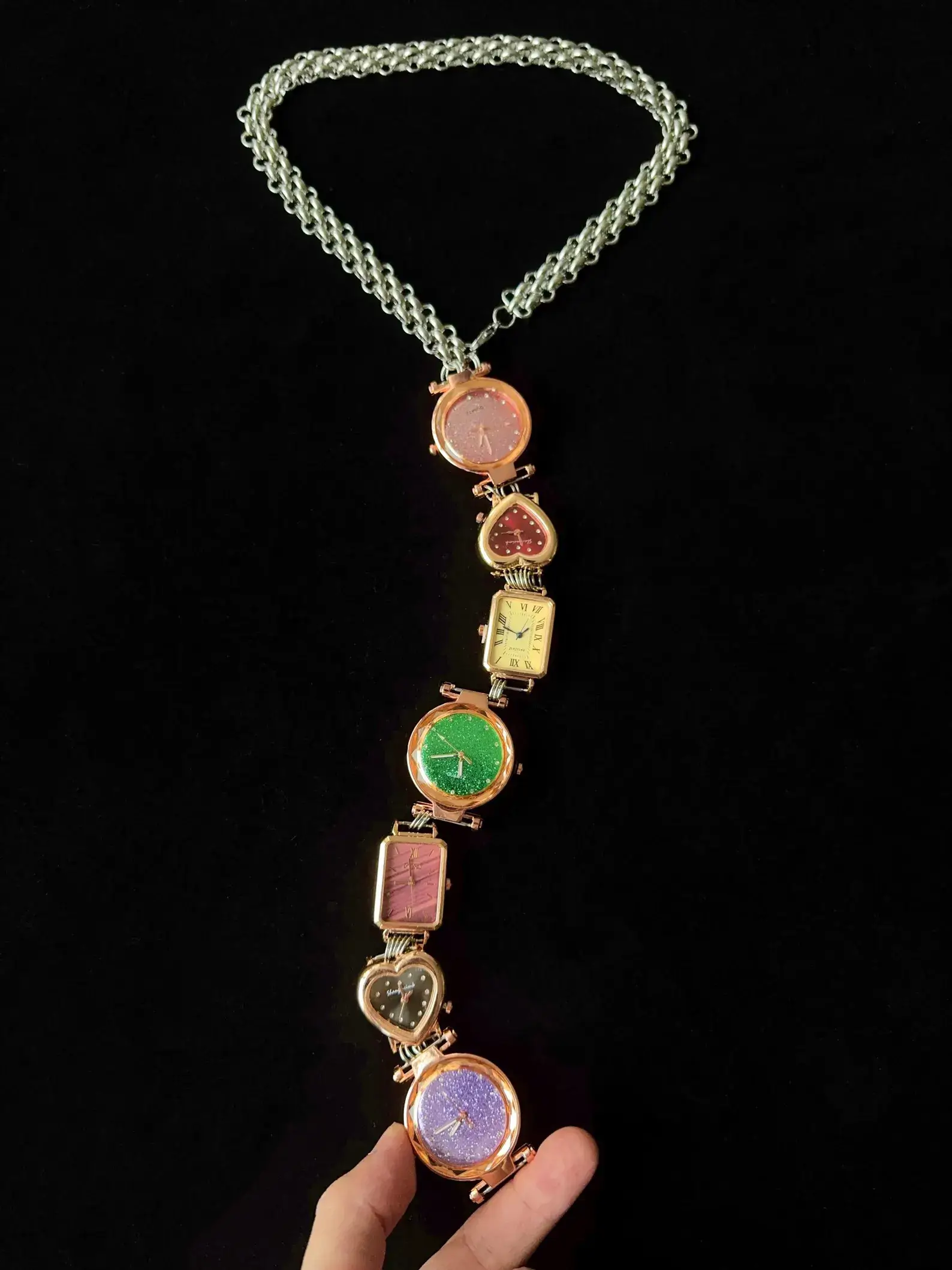 Y2K handmade celebrity watch necktie: A retro-inspired accessory featuring a functional mini watch on a stylish chain, designed to be worn around the neck, capturing the essence of early 2000s fashion with a celebrity touch.