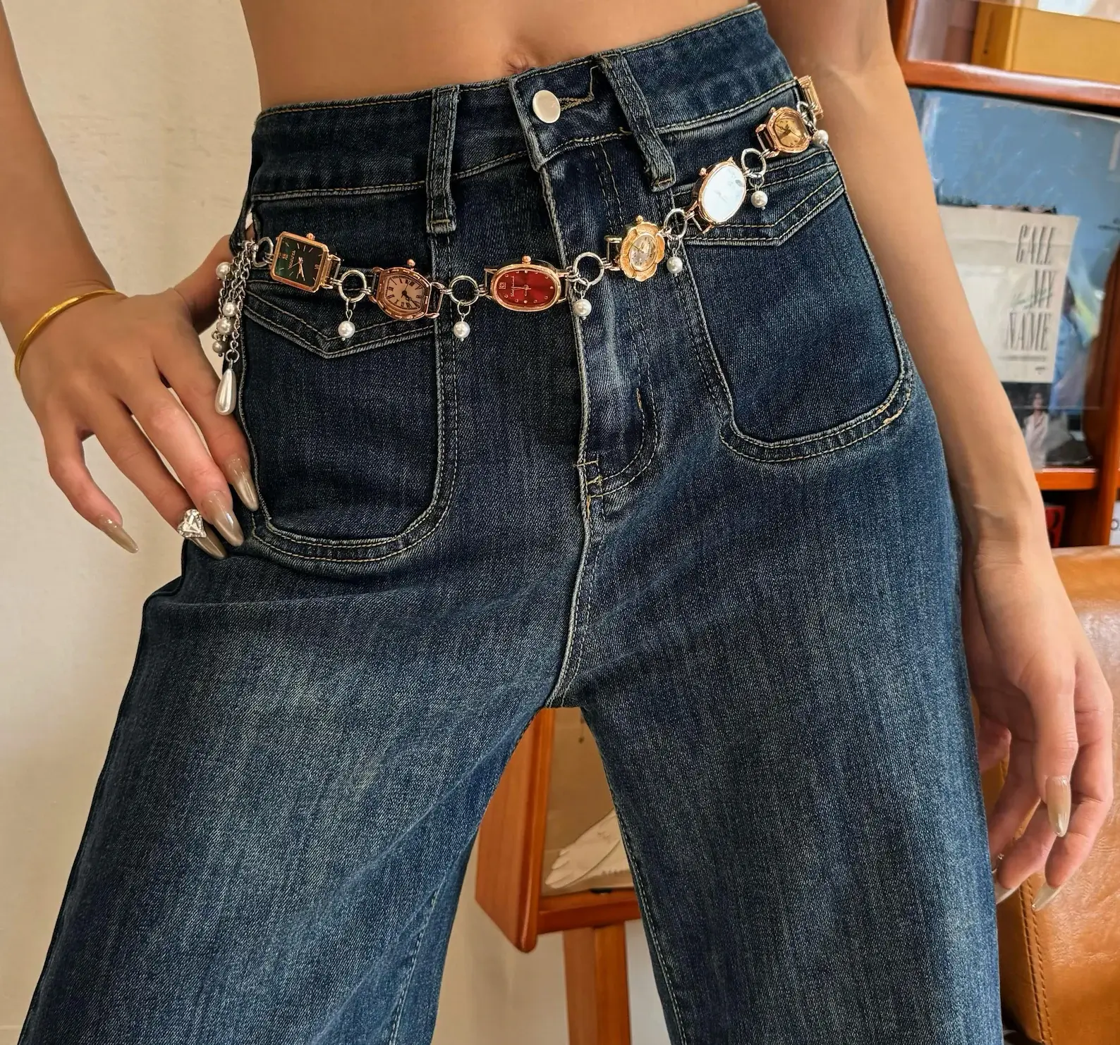 Watch belly chain for women: A delicate adjustable waist jewelry set featuring a functional miniature watch on a dainty silver chain, worn as a belly chain or waist chain around the hips, showcasing a boho-chic, festival-ready look with romantic elegance.