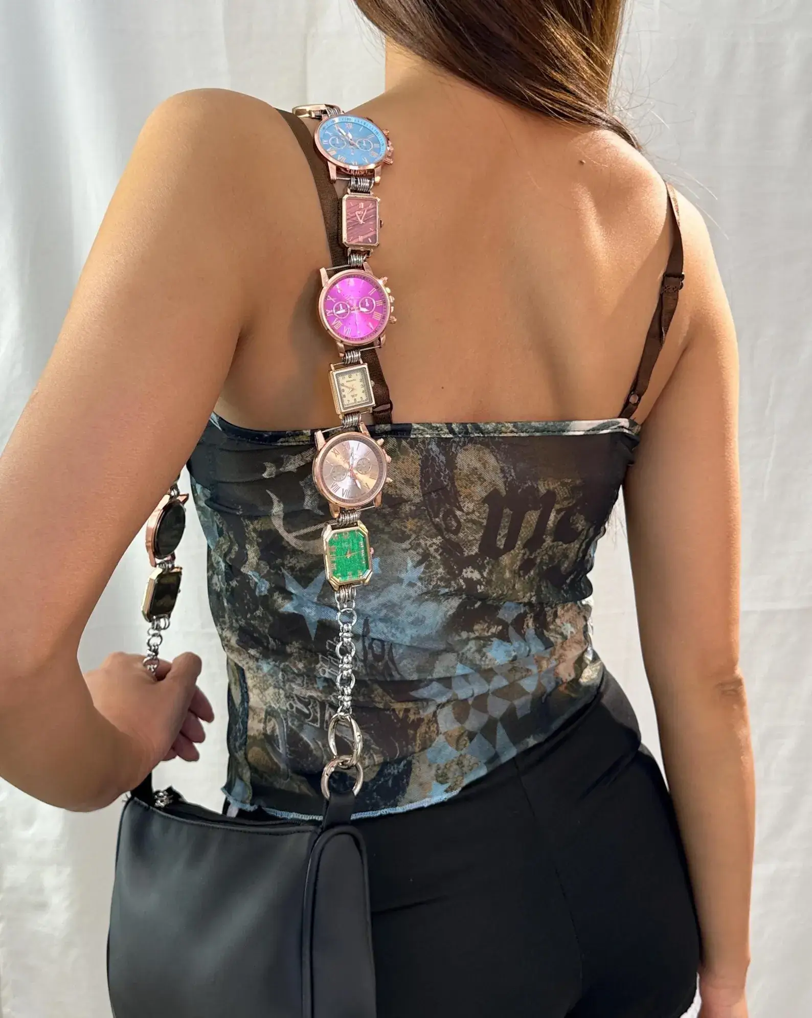 Gothic black chrome watch bag chain styled by BLACKPINK