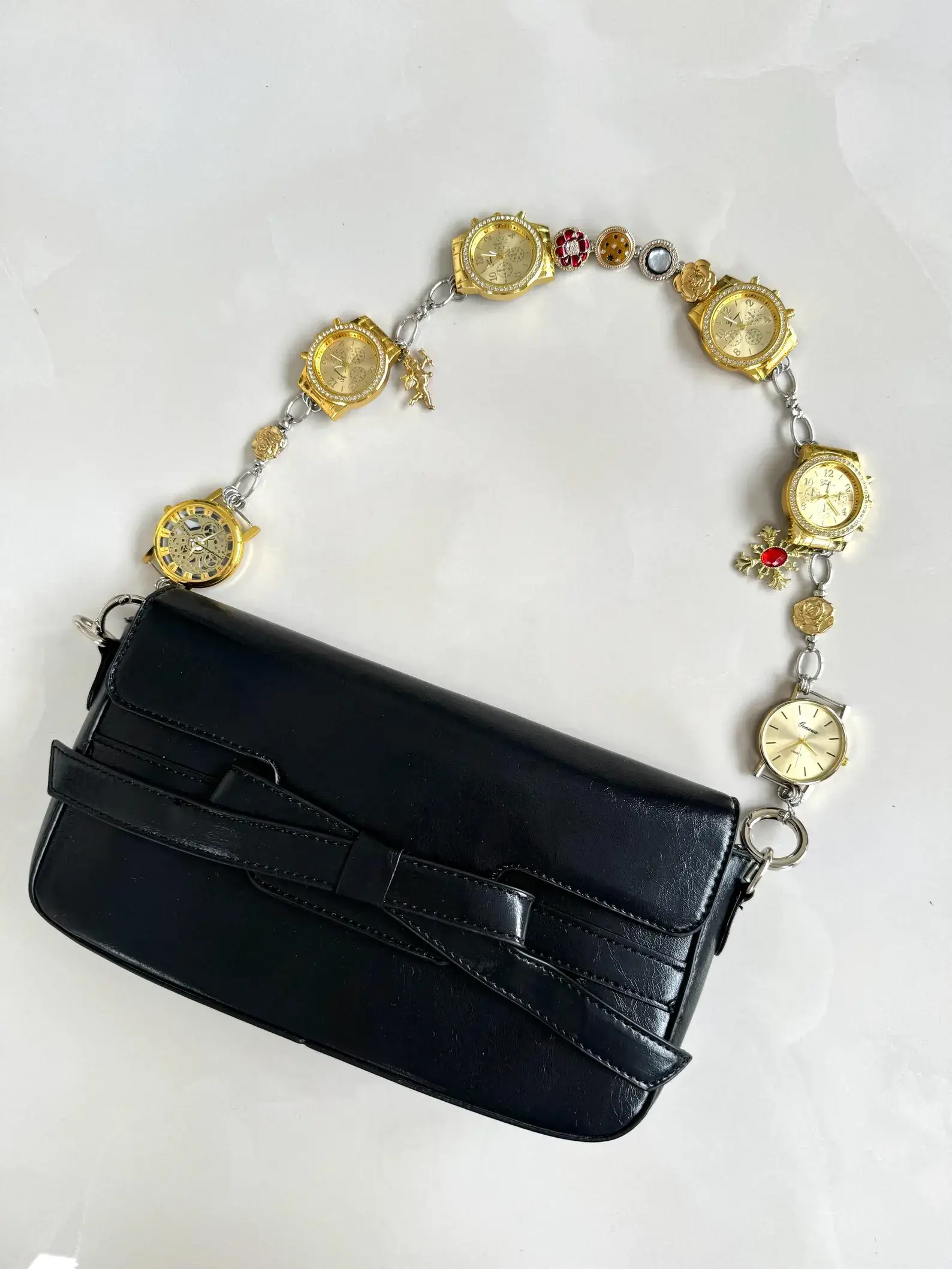 Rose gold minimalist watch bag chain worn by Bella Hadid