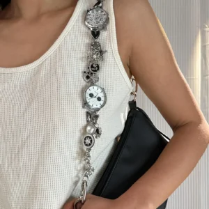 Elegant minimalist silver watch bag chain styled by Bella Hadid