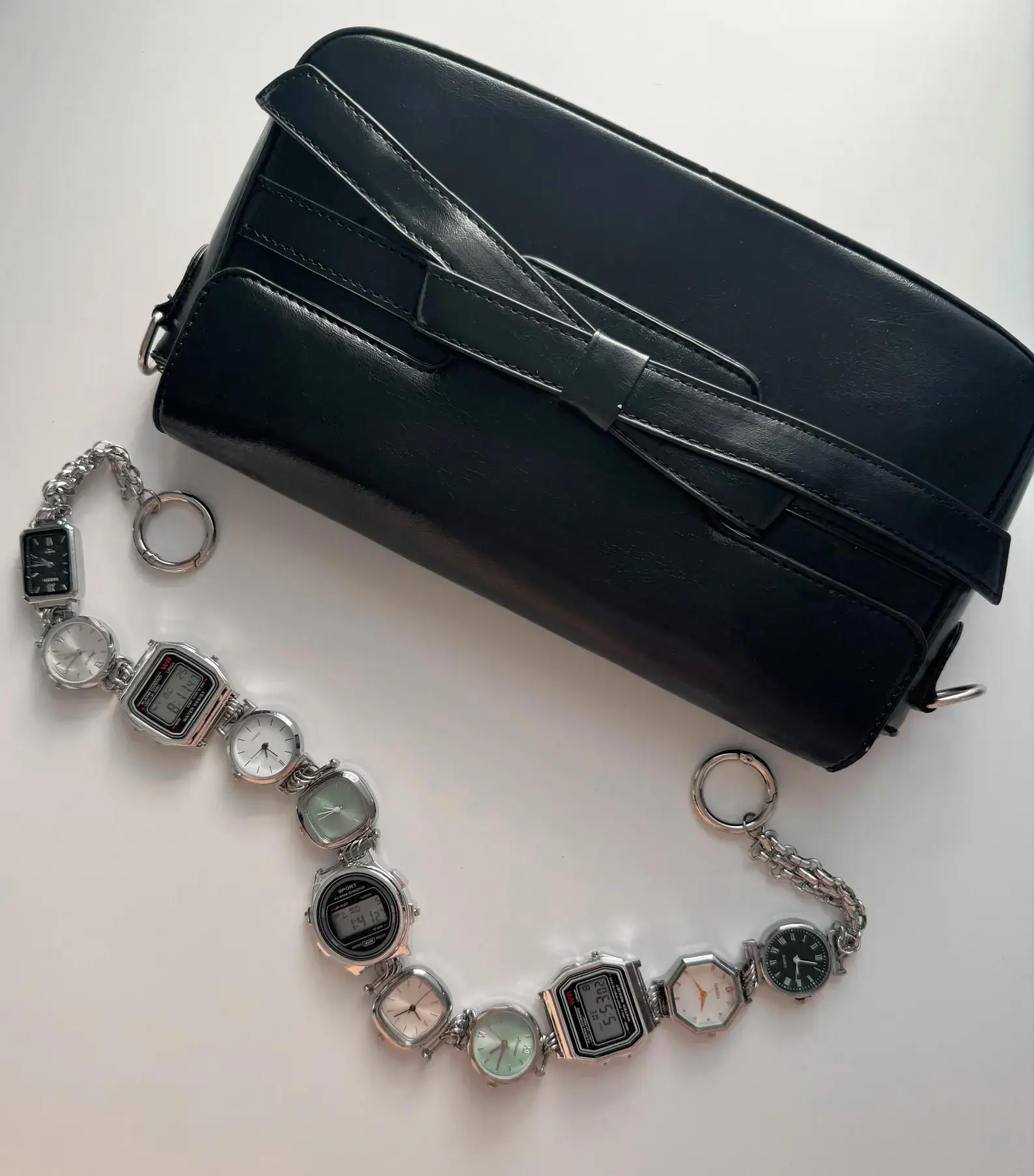 Gothic punk silver bag chain styled by Travis Scott