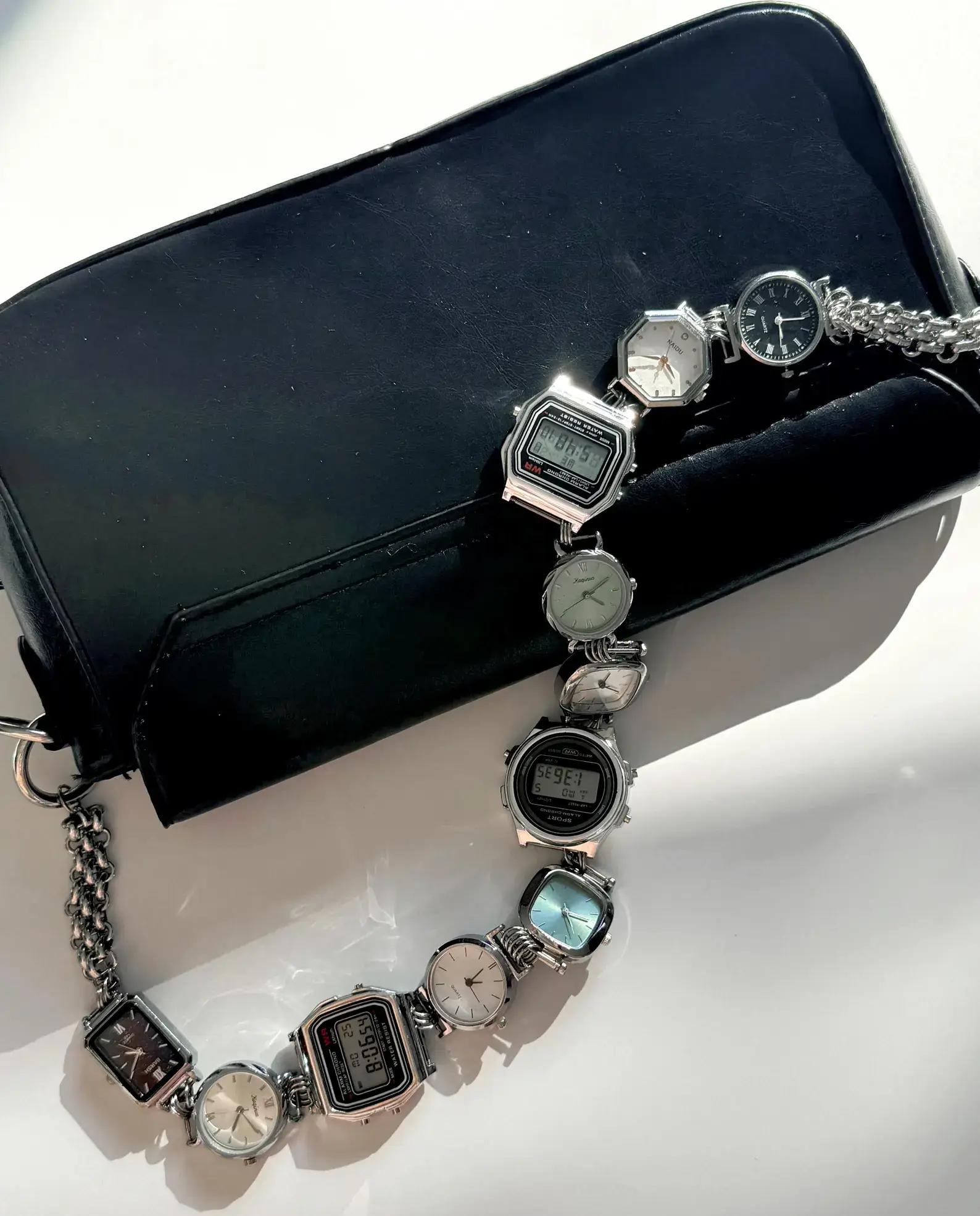 Gothic punk silver bag chain styled by Travis Scott