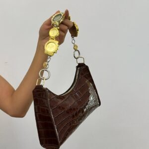 Chrome cyberpunk watch bag chain styled by Billie Eilish